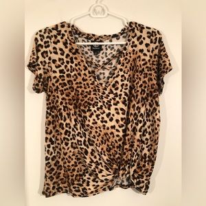 Babeau Leopard Crop top w knot and cris cross at neck. RayonSpandex blend